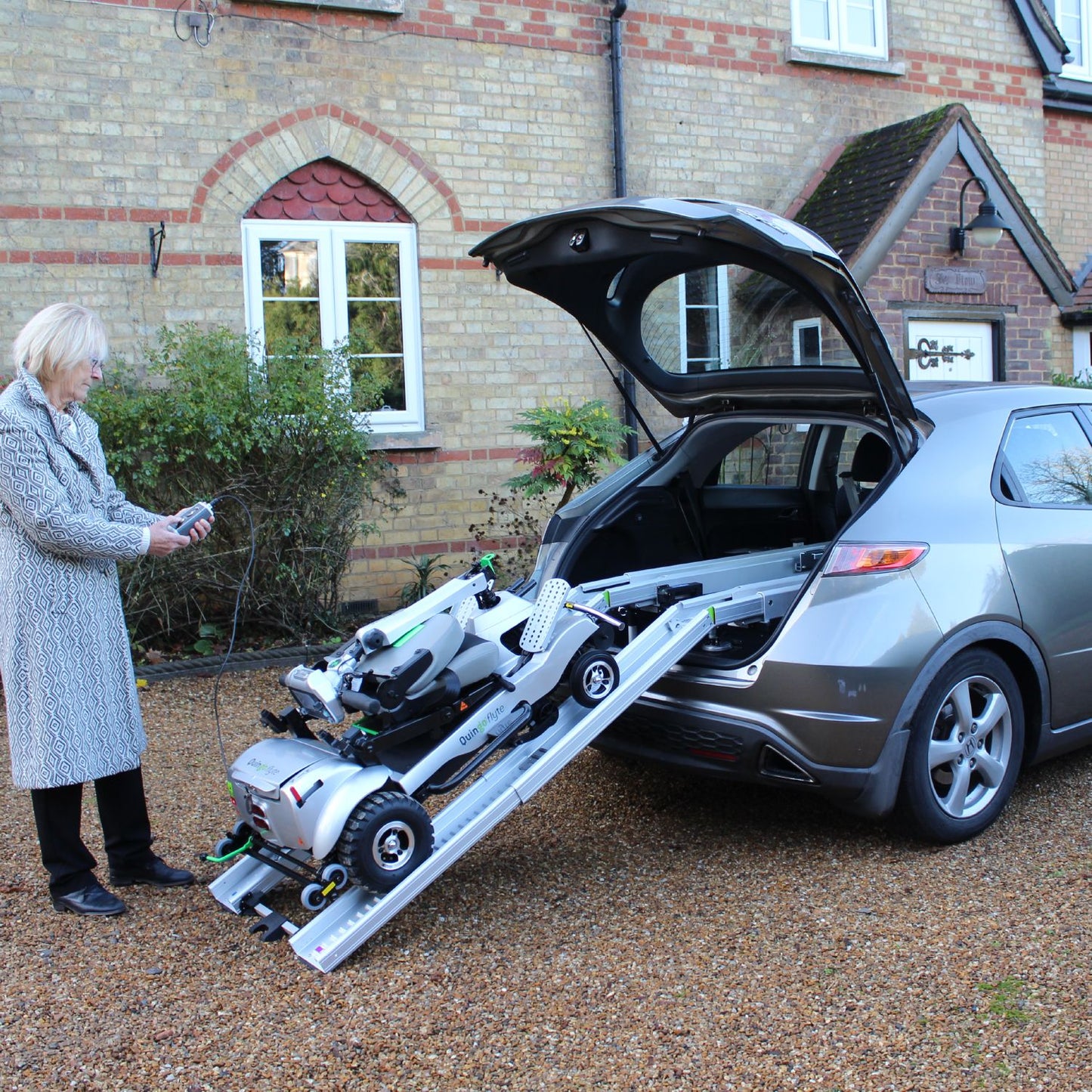 Quingo Flyte Mobility Scooter with MK2 Docking Station